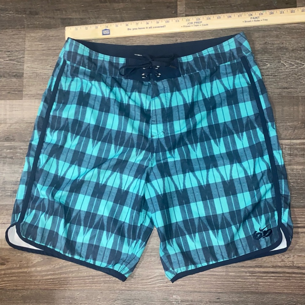 Nike 6.0 Men’s Board Shorts Swim Trunks, Size 36, Aqua Blue Geometric Pattern